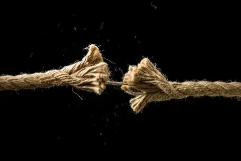 Fraying rope under tension